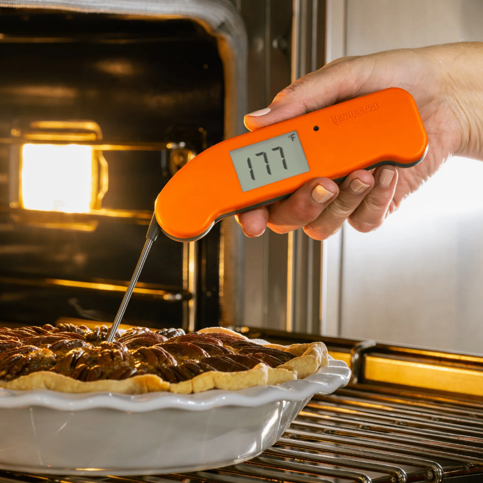 ThermoWorks Thermapen ONE checking the temperature of a baked dessert in the oven