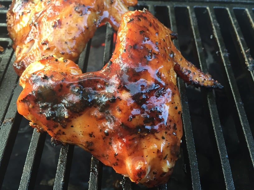 Chicken wings on cast iron grill grate